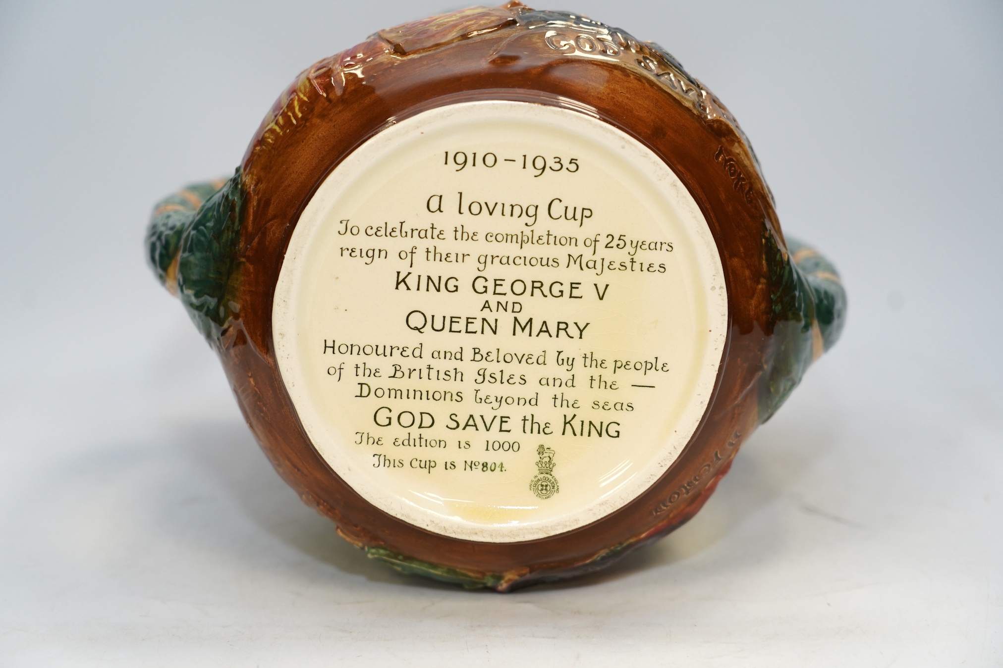 A Doulton limited edition commemorative loving cup, George V and Mary silver jubilee, 804/1000, 26cm. Condition - fine crazing to glaze, good